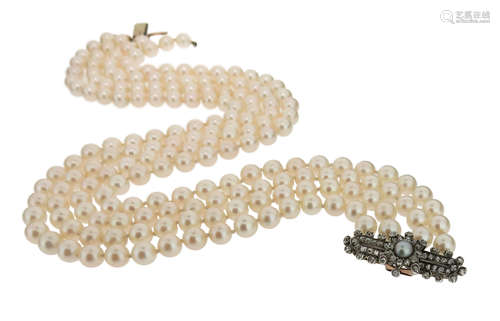 A four row cultured pearl necklace, (one row detached) with a Victorian pearl and diamond clasp, set