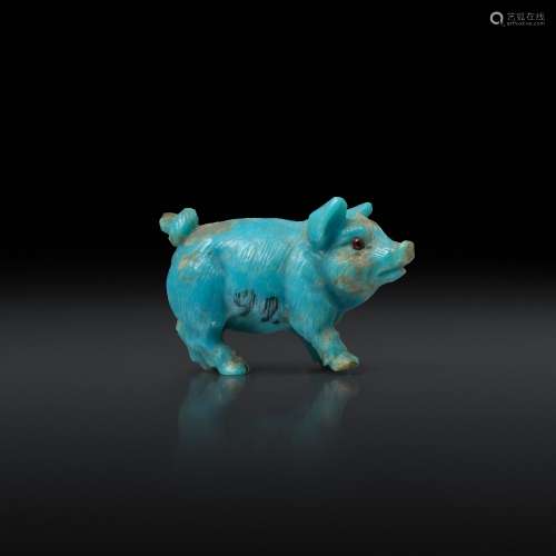 An early 20th century finely carved turquoise miniature pig in the style of Fabergé, carved with