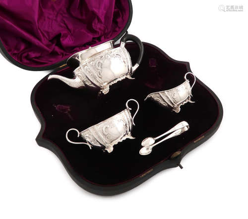A three-piece Victorian silver bachelor's tea set, by The Fenton Brothers, Sheffield 1896, oval