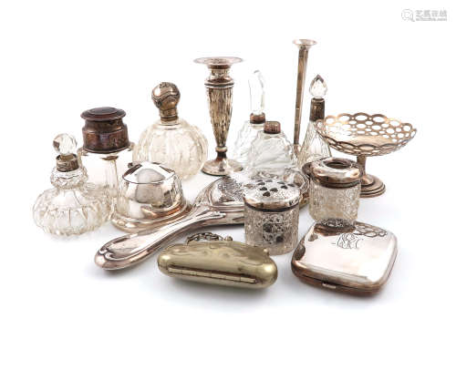 A mixed lot of silver items, various dates and makers, comprising: a silver travelling clock, London