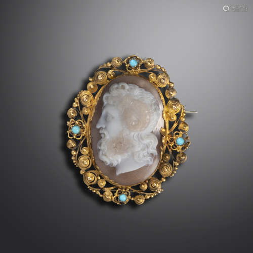 A late 18th century sardonyx cameo depicting Zeus Ammon, in an early 19th century turquoise-set gold