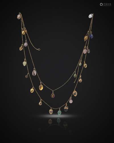 A two-row yellow gold fine-link necklace, c1900, suspending twenty-three assorted egg pendants and