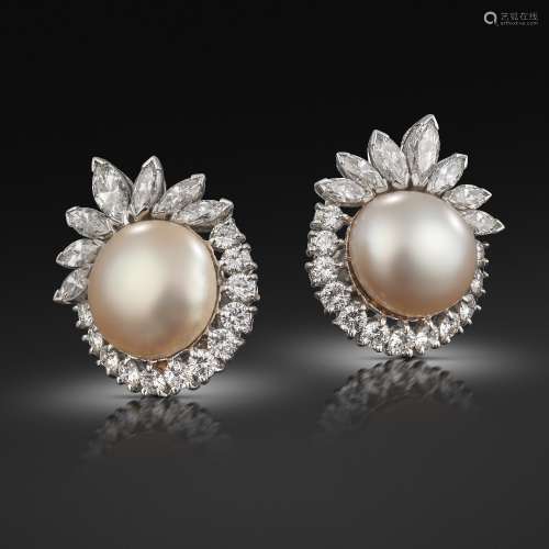 A pair of natural pearl and diamond cluster earrings, the button-shaped pearls are set within a