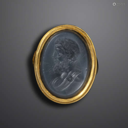 An 18th century grey onyx intaglio depicting Emperor Antoninus Pius, in profile and with pinned