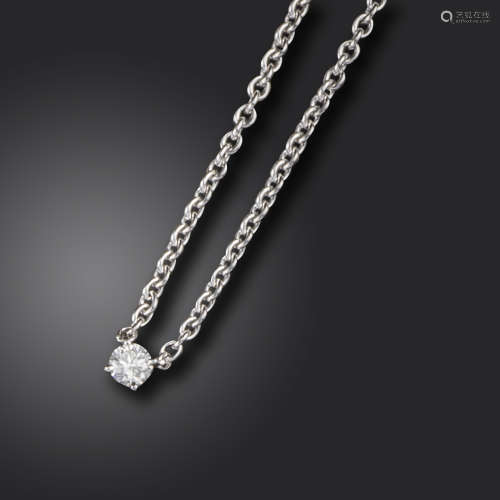 A diamond necklace by Cartier, set with a round brilliant-cut diamond weighing approximately 0.