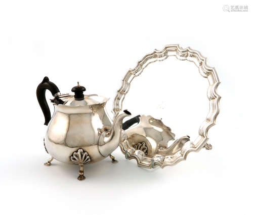 A late-Victorian silver teapot, by Charles Piling, London 1900, baluster form, wavy-edge border,
