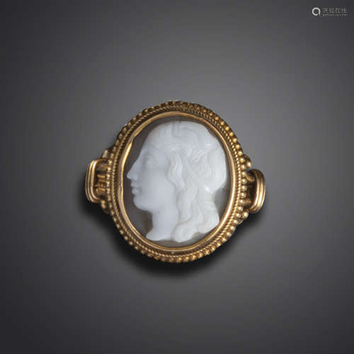 An 18th century sardonyx cameo depicting a portrait of a youth, in a 19th century Archaeological