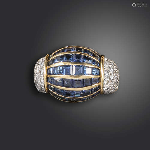 A sapphire and diamond-set bombé ring, set with rows of calibré-cut sapphires, the shoulders pavé-