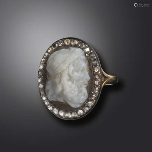 A 19th century hardstone cameo depicting the head of Zeus, in a 19th century ring set with a