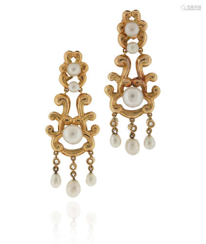 A pair of French pearl-set gold earrings, the graduated pearls set within gold scrolling mounts,