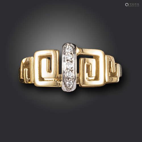 A gold and diamond ring by Lalaounis, of Greek keypattern design, centred with a line of diamonds in