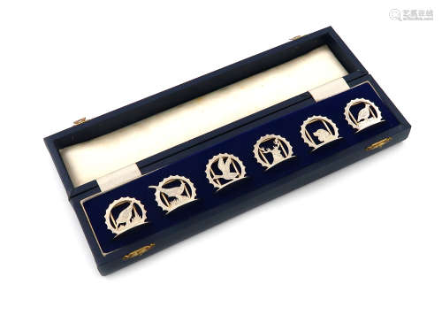 A set of six modern silver menu card holders, by Garrard and Co., London 1990, pierced and