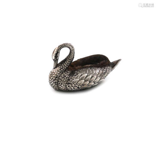 A novelty silver swan pin cushion, by Adie and Lovekin, Birmingham 1911, modelled in a swimming