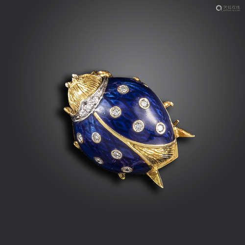 A diamond and blue enamel ladybird brooch by Van Cleef & Arpels, in textured yellow gold and