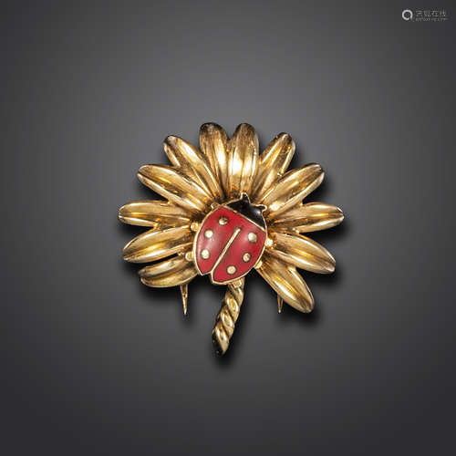 A gold and enamel ladybird clip brooch by Cartier, the ladybird with red and black enamel