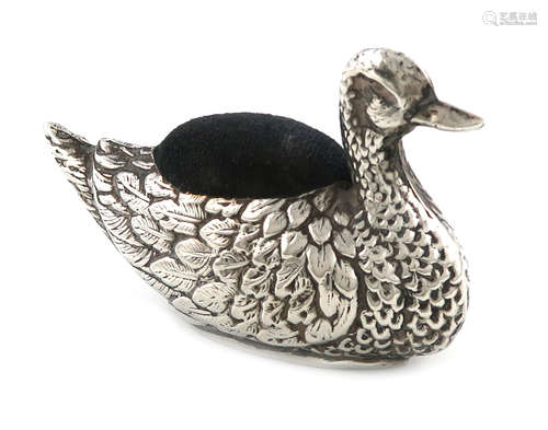 A novelty silver duck pin cushion, possibly by H J Cooper & Co Ltd, Birmingham 1920, modelled in a