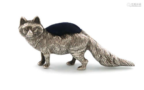 An Edwardian novelty silver fox pin cushion, maker's mark worn, Birmingham 1905, modelled in a