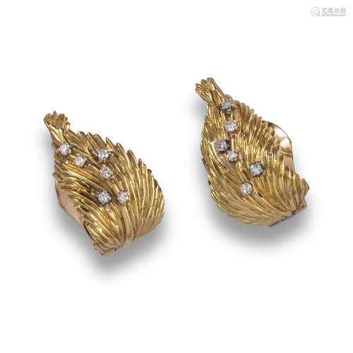 A pair of diamond set gold earrings by Van Cleef & Arpels, the textured yellow gold leaves set