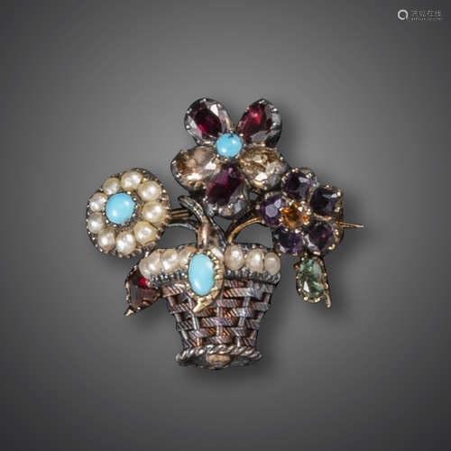 A Regency giardinetto brooch, set with seed pearls, turquoise, garnets and an emerald in closed-back