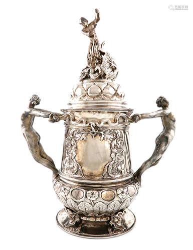 By Frederick Courthope, a monumental Victorian silver two-handled cup and cover, London 1886,