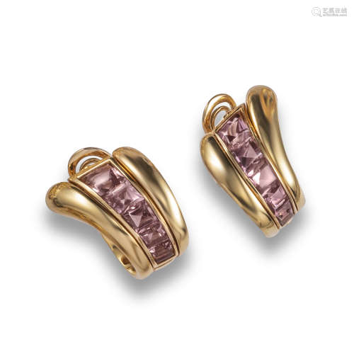 A pair of pink tourmaline and gold earrings by Verdura, set with graduated buff-top pink tourmalines