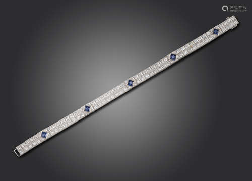 An Art Deco sapphire and diamond bracelet, set with pairs of old circular-cut diamonds millegrain