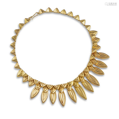 A yellow gold fringe necklace by Lalaounis, of foliate form, with heavily chased lozenge and