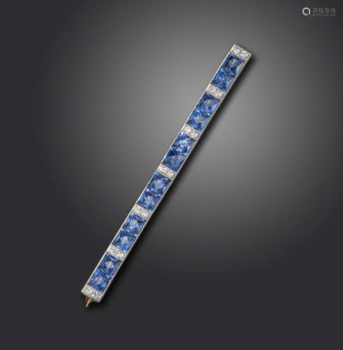 An early 20th century sapphire and diamond bar brooch, set with pairs of French-cut sapphires and