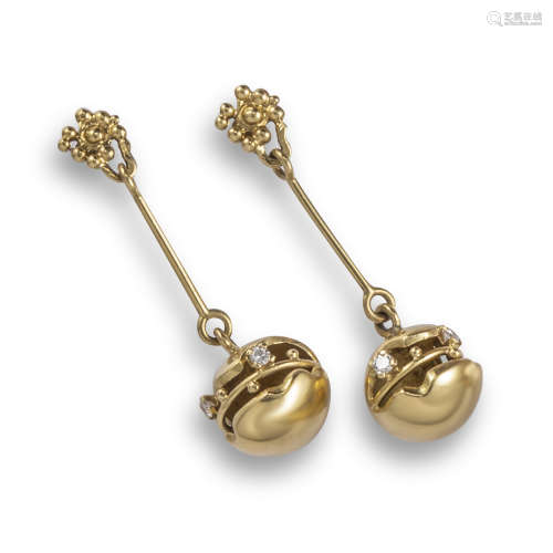 A pair of spherical diamond drop earrings, the pierced ovoids set with diamonds, suspended from gold