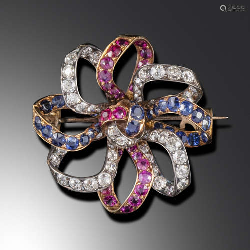 A late Victorian ruby, sapphire and diamond jubilee brooch, c1887, formed from alternate stylised