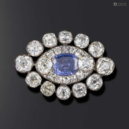 A George III sapphire and diamond brooch, the lozenge set with graduated old cushion-shaped