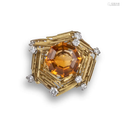 A citrine and diamond bird's nest ring, c1970, the octagonal-cut citrine is set within textured gold