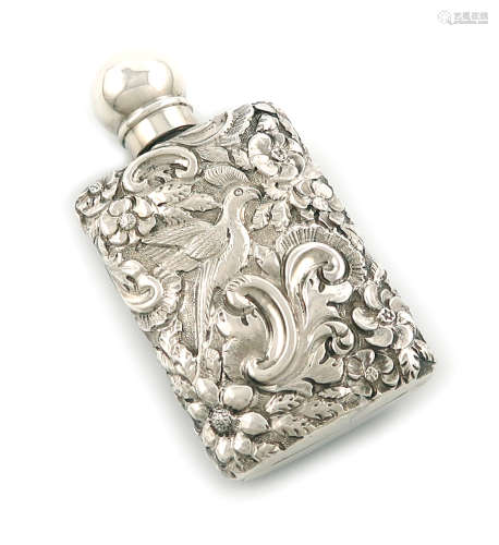 A Victorian silver scent flask, by S. Mordan and Co, London 1890, oval rectangular form, embossed