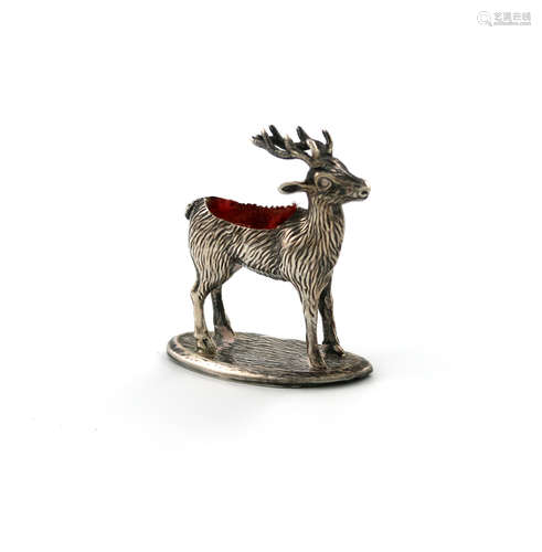 A novelty silver stag pin cushion, by Adie and Lovekin, Birmingham 1911, modelled in a standing