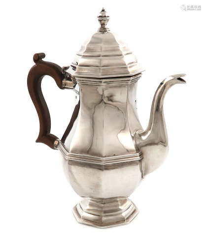 A silver coffee pot, by Carrington and Co., London 1919, octagonal baluster form, scroll handle,