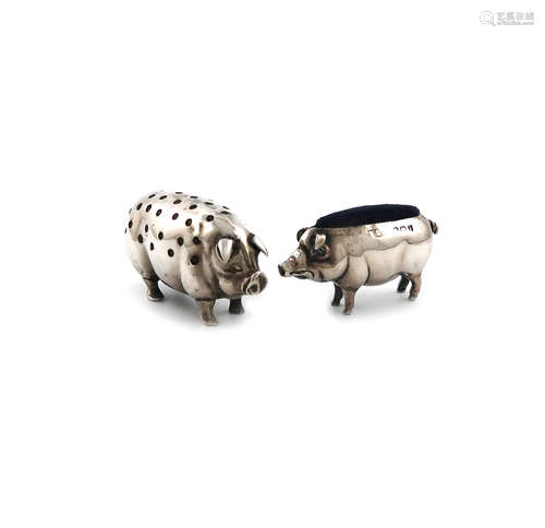 Two Edwardian novelty silver pig pin cushions, one by Levi and Salaman, Birmingham 1905, the other