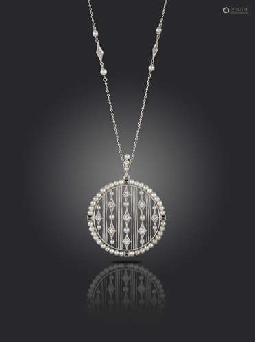 An early 20th century circular diamond seed pearl and black onyx-set pendant, the pierced lattice