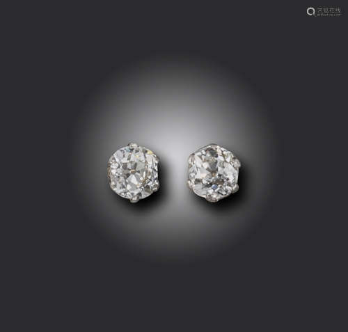 A pair of diamond stud earrings, set with old cushion-shaped diamonds weighing approximately 0.95cts