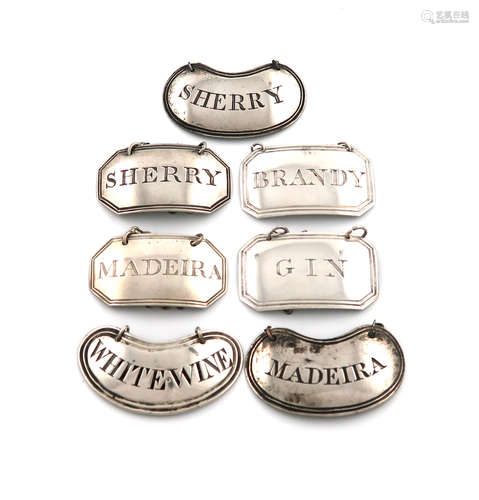 A mixed collection of seven silver wine labels, comprising: a pair by Joseph Willmore, Birmingham