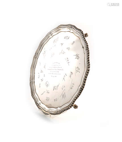 A presentation silver salver, by the Barker Brothers, Birmingham 1937, circular form, gadroon