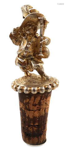 A Victorian silver-gilt bottle stopper, by Robert Hennell, London 1858, modelled as a standing dwarf