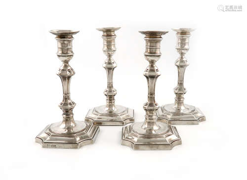 A set of four silver candlesticks, by The Goldsmiths and Silversmiths Company, London 1927,