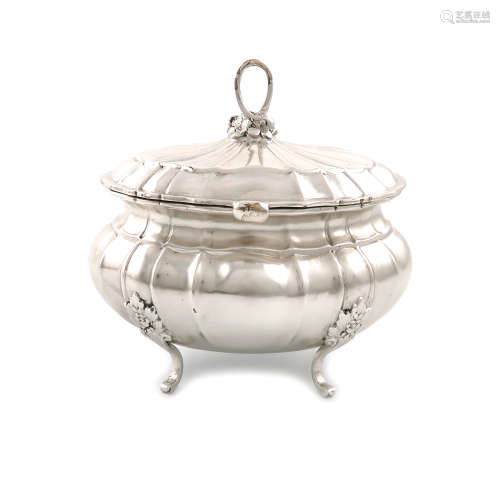 A German silver tea caddy / sugar box, circa 1920, lobed oval bellied form, the hinged cover with