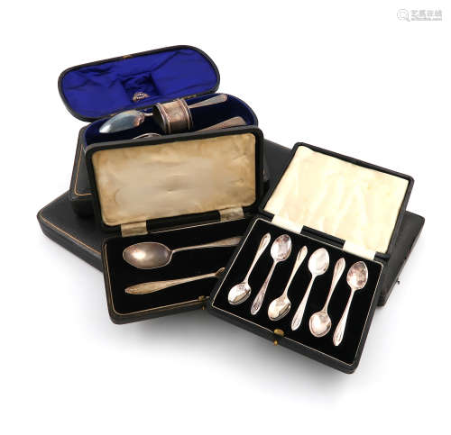 A mixed lot of seven cased sets of silver flatware, comprising: a pair of Victorian fruit serving