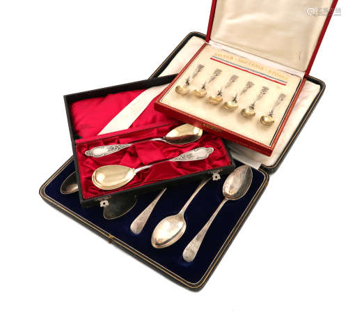 A set of six silver Old English pattern dessert spoons, by J. Round, Sheffield 1922, the terminals