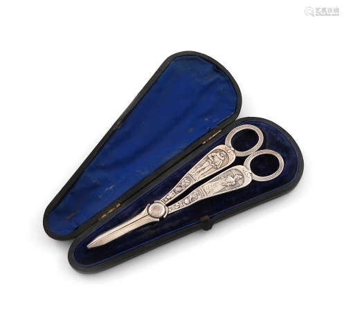 A pair of Victorian silver grape scissors, by Elkington and Co., Birmingham 1889, the handles with a