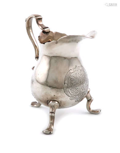 An 18th century silver cream jug, maker's mark only, possibly R*T, possibly American, baluster form,
