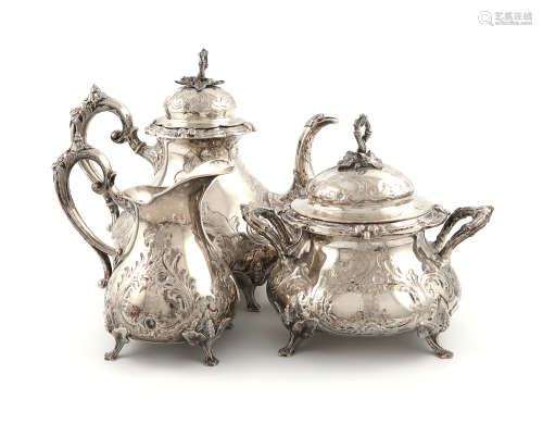 λA three-piece late 19th century Belgian silver tea set, circa 1880, baluster form, embossed with