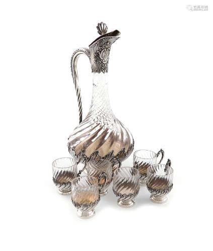 A French silver-mounted liqueur set, the ewer with maker's mark of R.B in a lozenge, the cups by