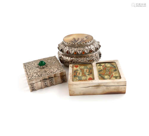 A mixed lot of silver boxes, comprising: one with an Austrian import mark, oval form, the hinged